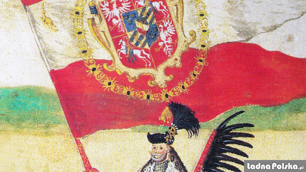 Chorąży husarski ze skrzydłami i flagą Królestwa Polskiego z godłem Zygmunta III Wazy